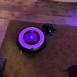 roomba robot vacuum with charging device